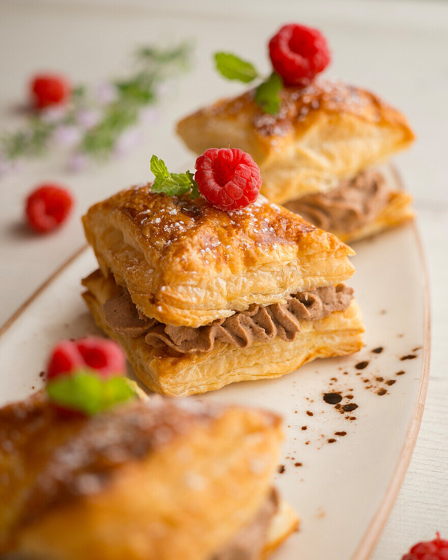 Puff pastry cake with chocolate truffle filling