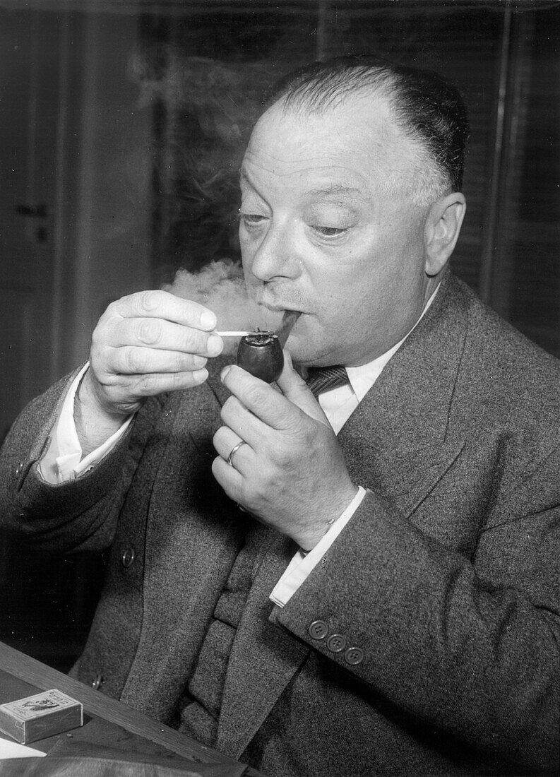 Wolfgang Pauli smoking a pipe