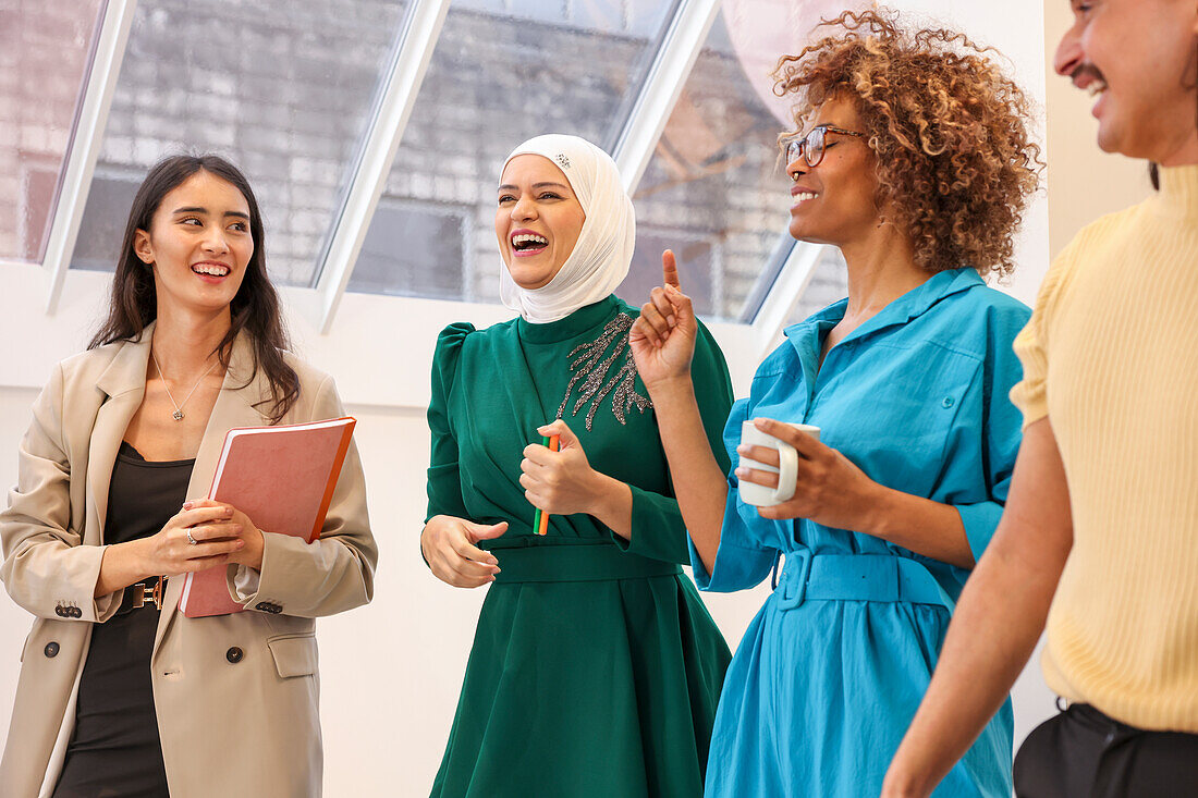 Employees smiling in office