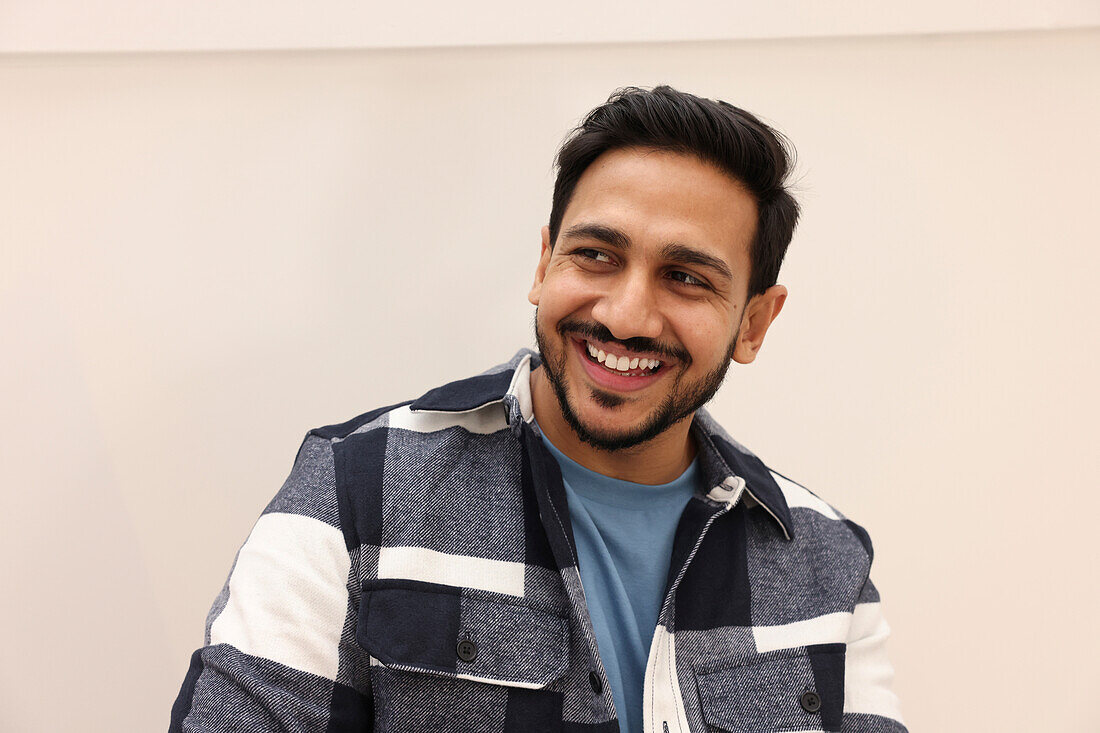 Smiling man in office