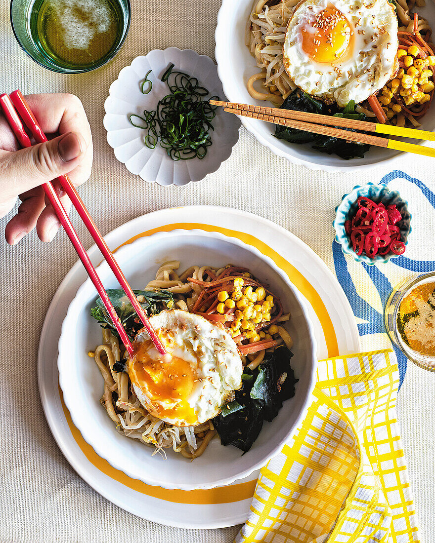 Vegetarian soba noodles with fried egg and vegetables