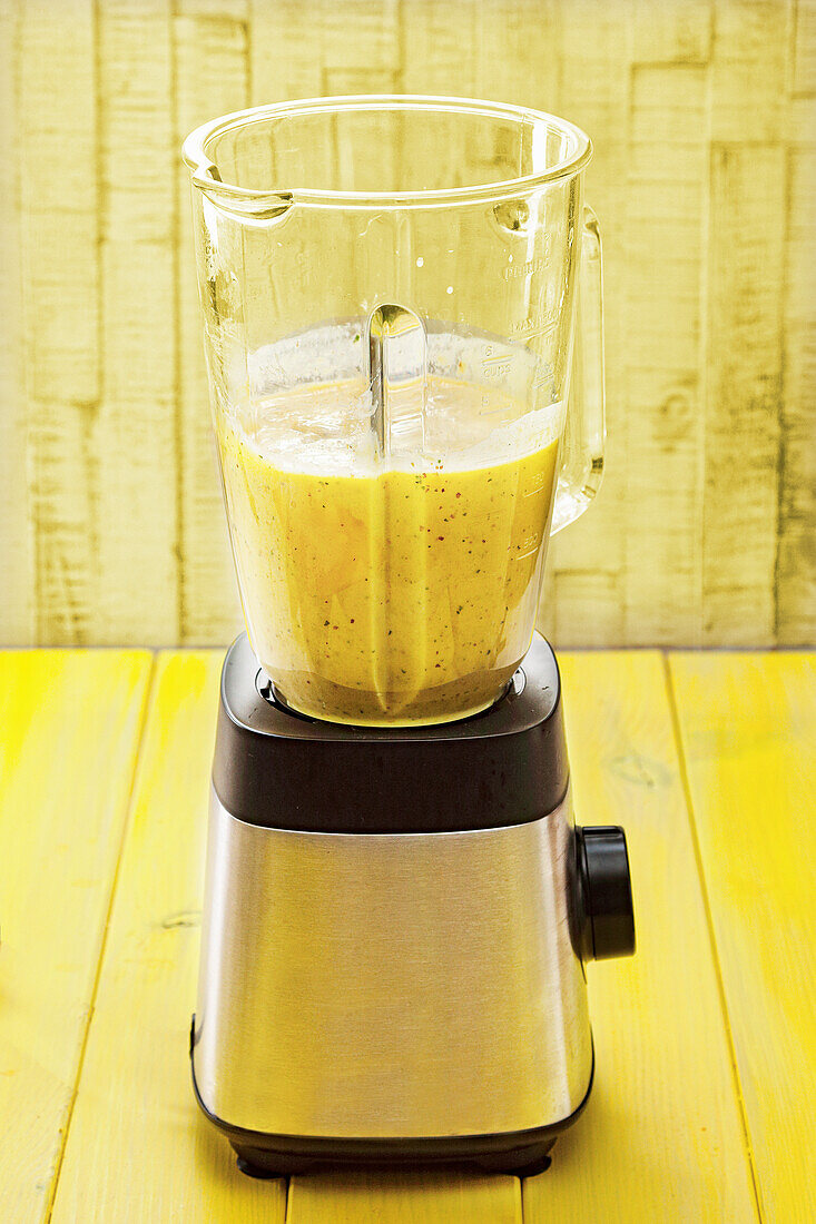 Mixture for mango-mint ice cream in the blender