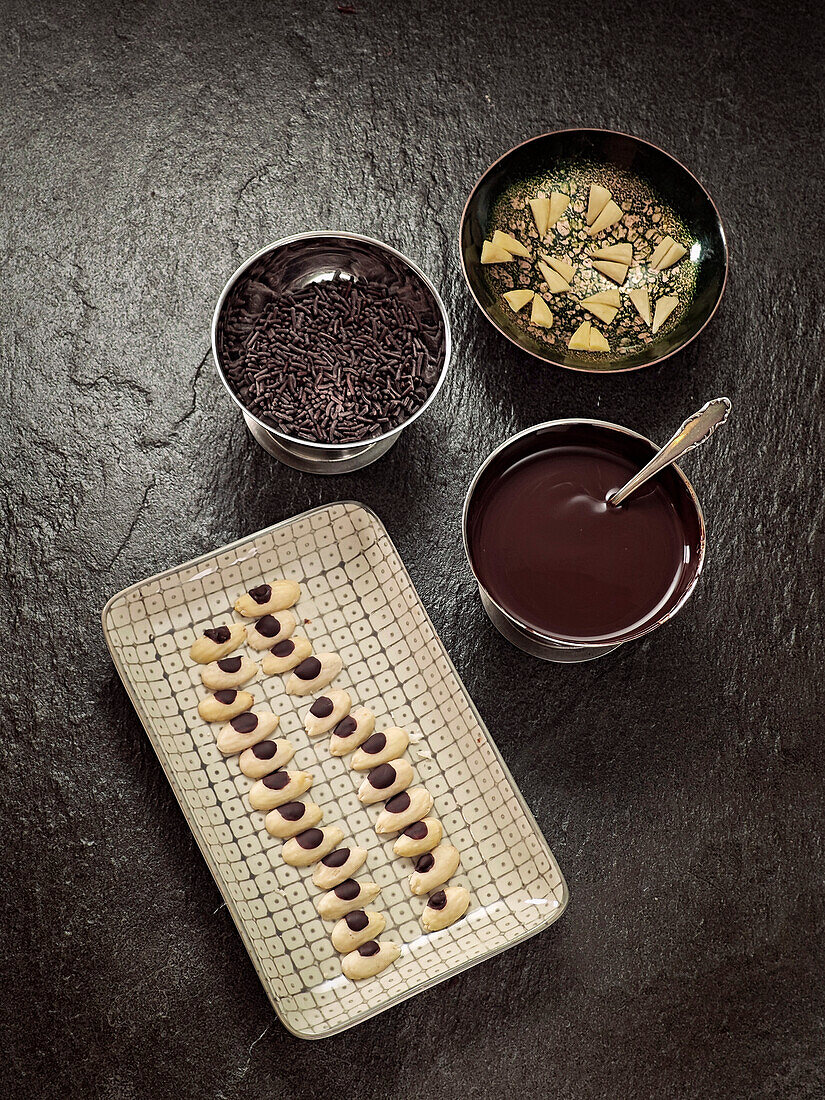 Various chocolate toppings and almonds to decorate