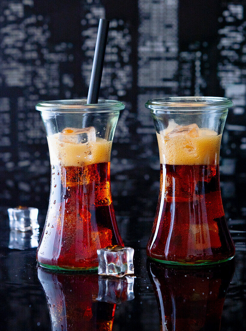 Cola on ice in a mason jar