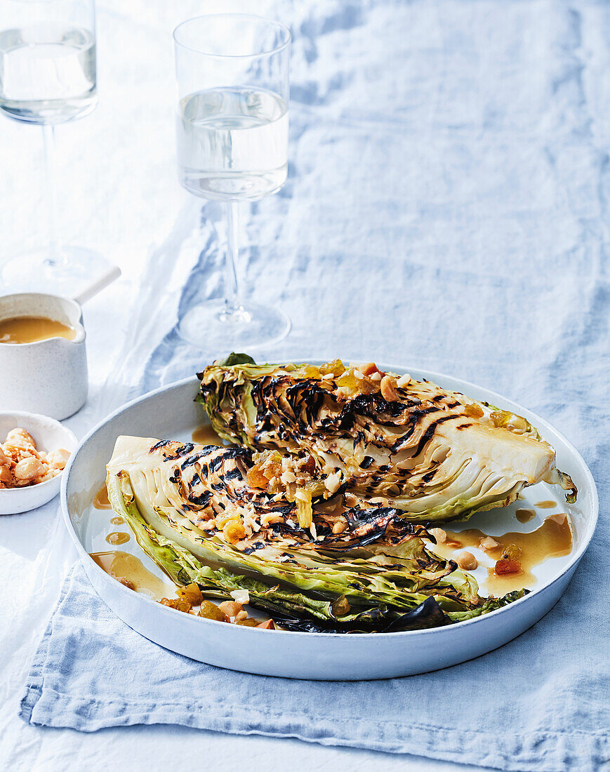 Grilled cabbage with macadamias and fennel sauce