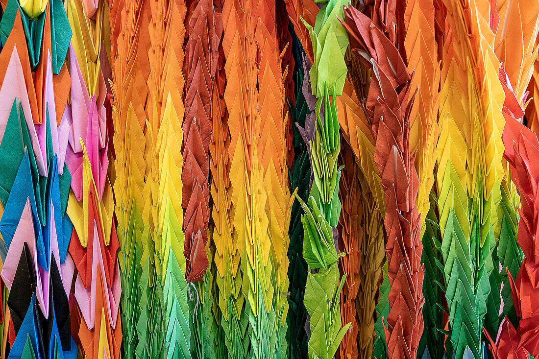 Chain of origami paper cranes hanging at the Atomic Bomb Nagasaki Peace Memorial Museum, Nagasaki, Japan