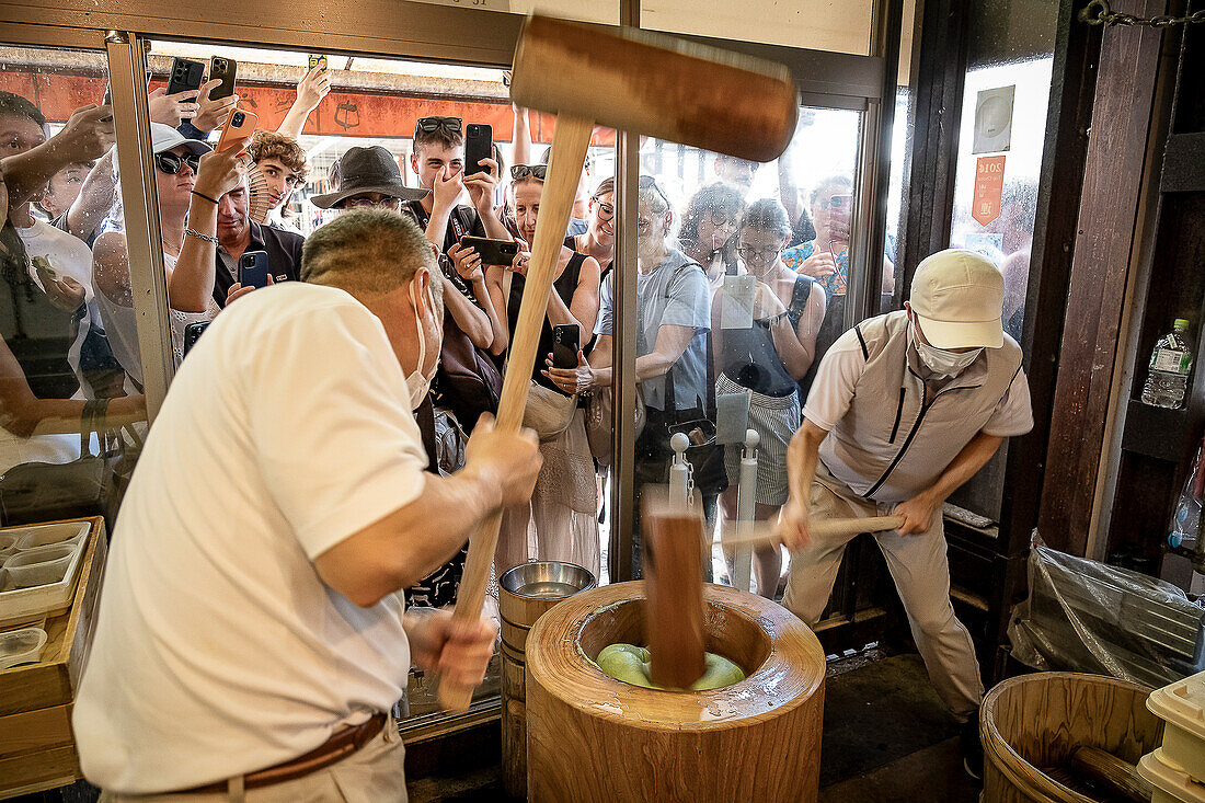 Making the traditional Daifuku in Nakatanidou shop, made of soft rice cake (mochi) fill with sweet bean paste, in Nara Japan.