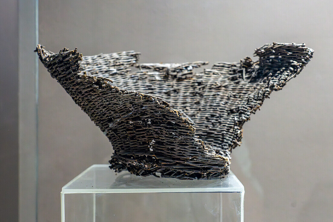 Pre-Hispanic Amerindian woven basket in the Pio Pablo Diaz Archeological Museum in Cachi, Argentina. Regional Development Period.