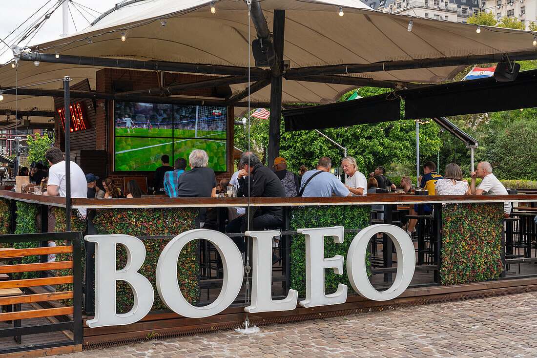 Patrons in a restaurant & bar in the revitalized Puerto Madero section of Buenos Aires, Argentina.