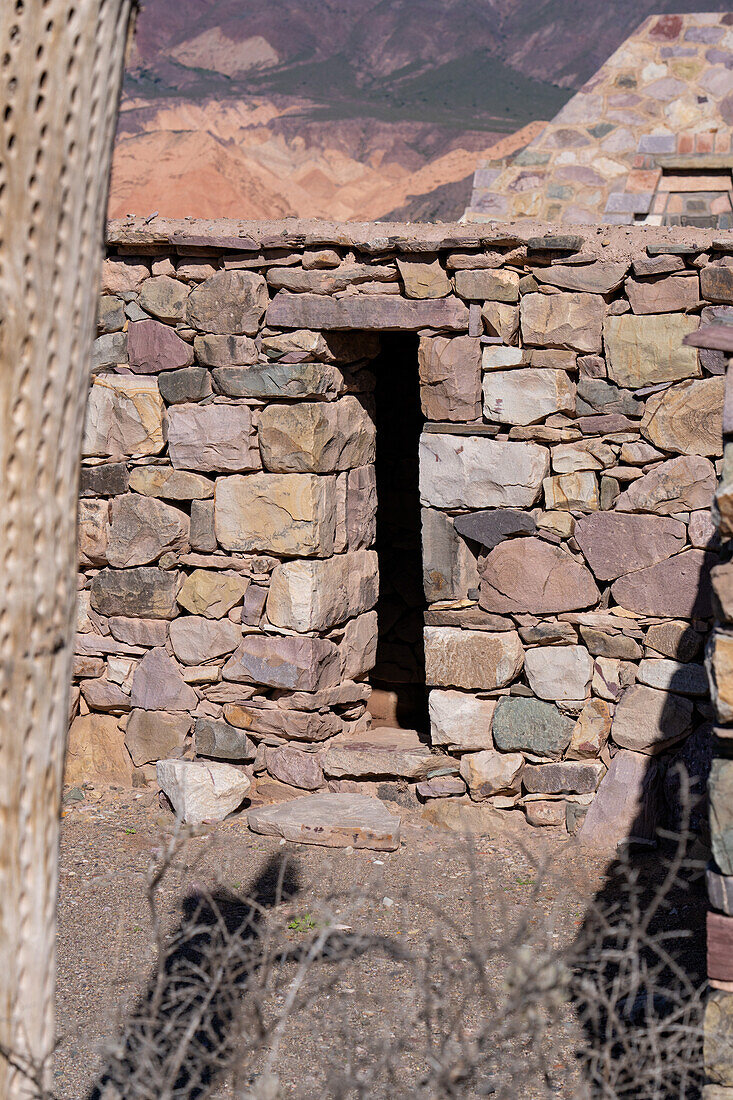 Partially reconstructed ruins in the Pucara of Tilcara, a pre-Hispanic archeological site near Tilcara, Humahuaca Valley, Argentina.