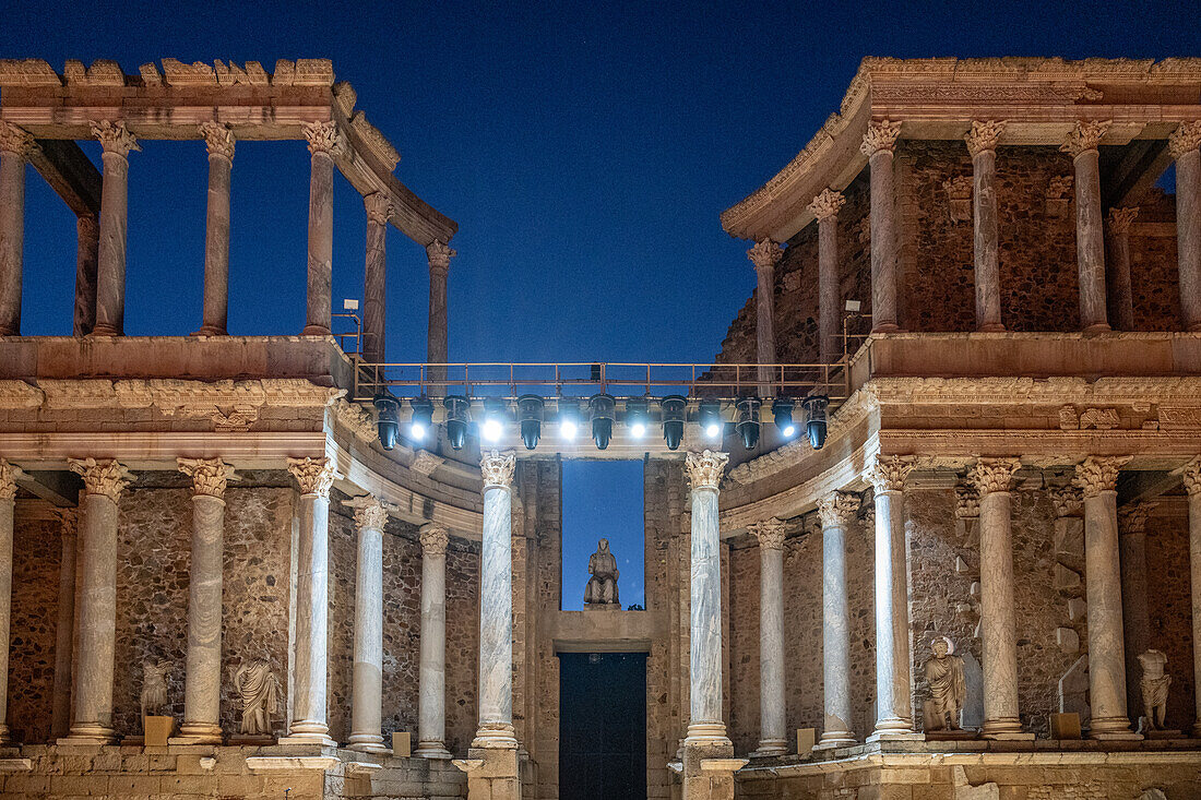 Merida, Spain, Aug 15 2024, Majestic night view of the ancient Roman Theater in Merida, Spain, beautifully illuminated and prepared for an evening performance under the starry sky.