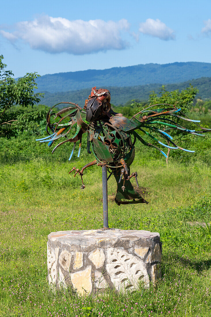 Metal sculpture of a parrot at the information center for Calilegua National Park in Argentina.