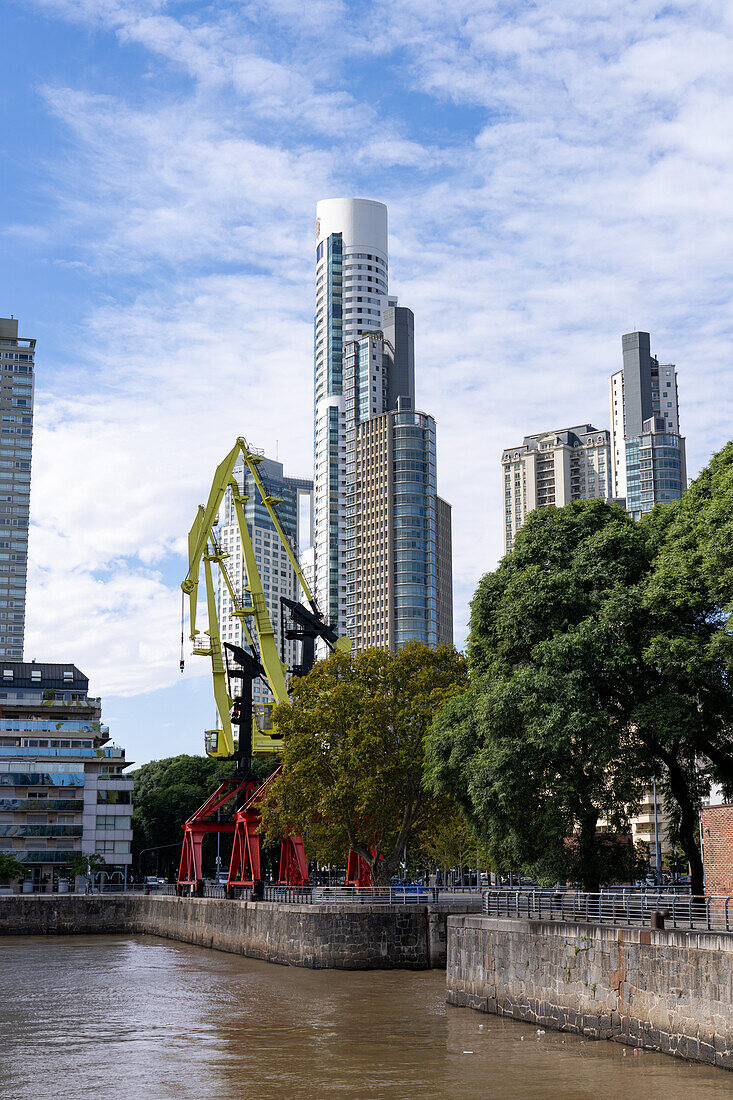 The Alvear Tower in Puerto Madero is the tallest building in Buenos Aires, Argentina. Dock 3 is in the foreground.