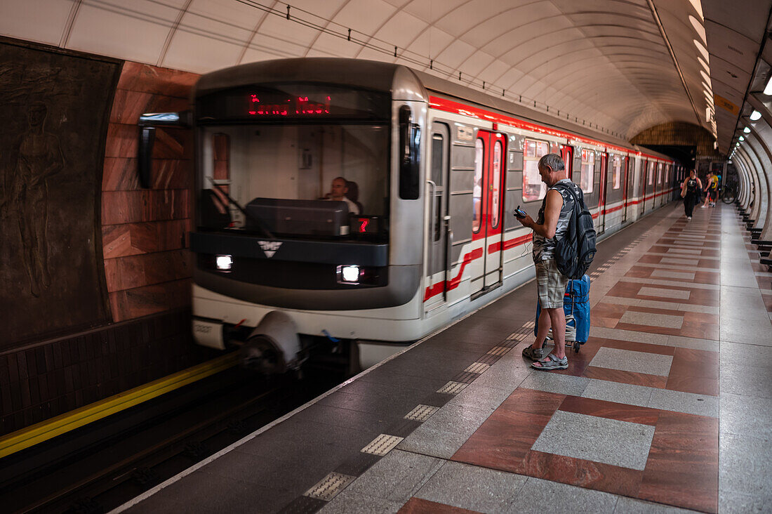 People in Prague Metro platform