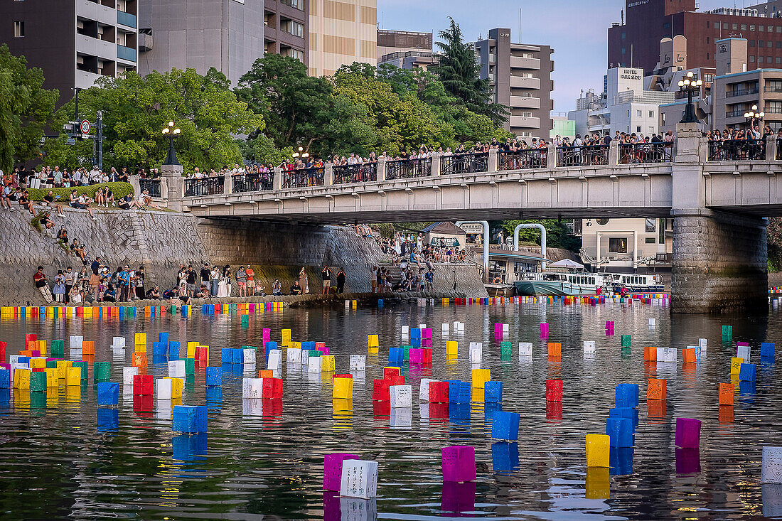 Motoyasu bridge in front of Atomic Bomb Dome with floating lamps on Motoyasu-gawa River during Peace Memorial Ceremony every August 6 in Hiroshima, Japan