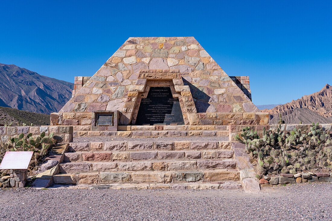 A modern pyramid built in the ruins in the Pucara of Tilcara, a pre-Hispanic archeological site near Tilcara, Argentina. The pyramid is a memorial to the archeologists who excavated the ruins.