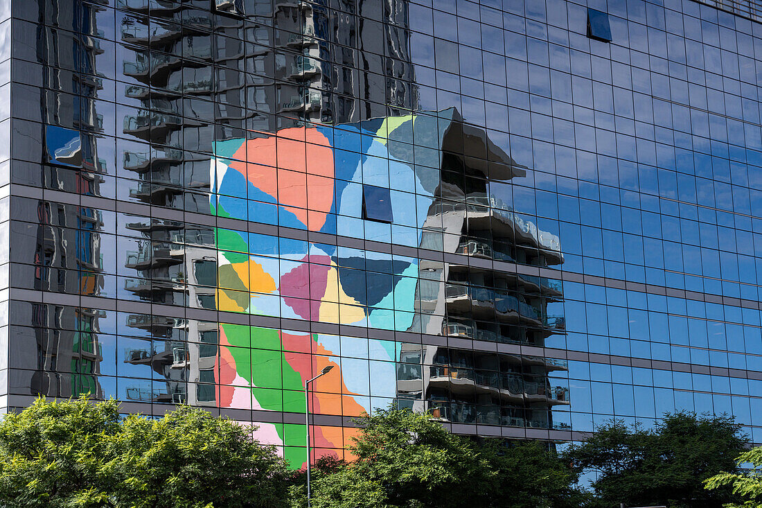 The SLS Puerto Madero hotel reflected in the glass of a nearby building in Puerto Madero, Buenos Aires, Argentina.