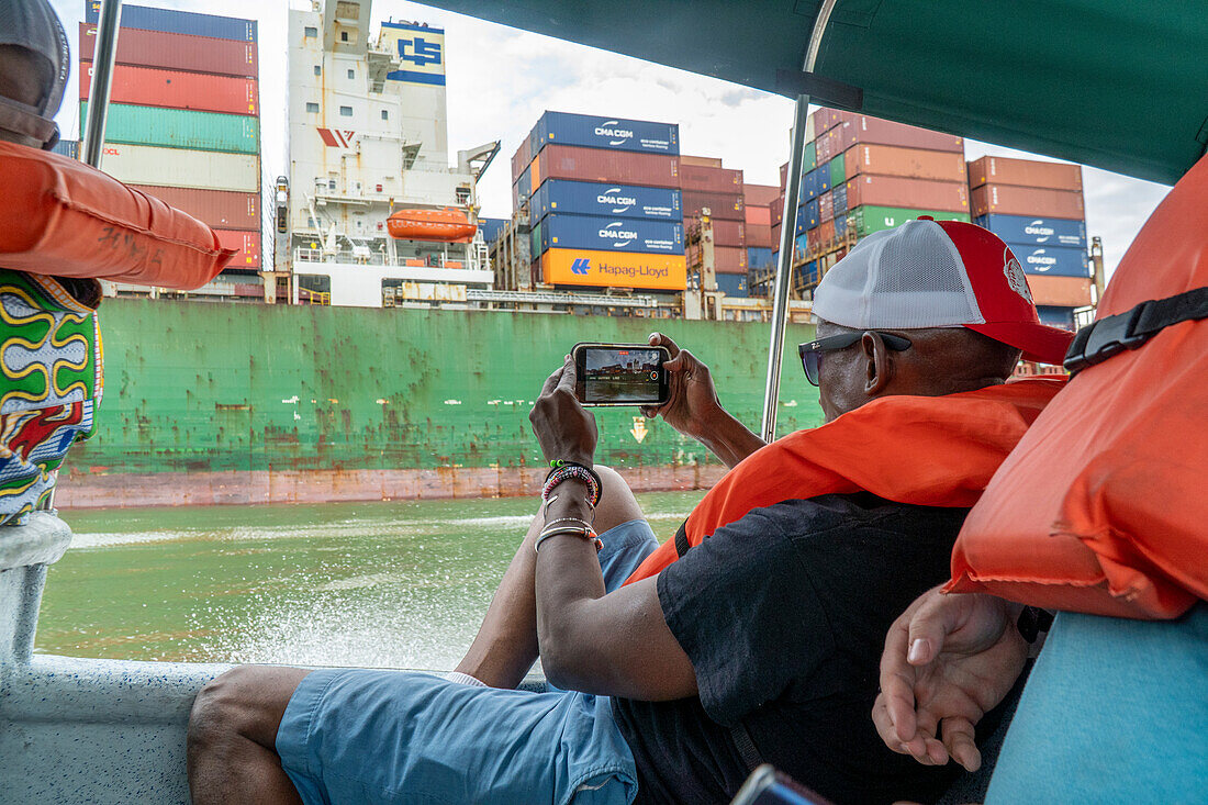 Cargo ship passing through the Panama Canal.