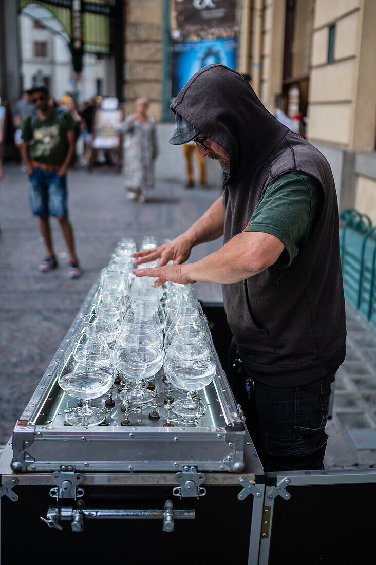 Petr Spatina, Glass Harpist, plays in the streets of Prague