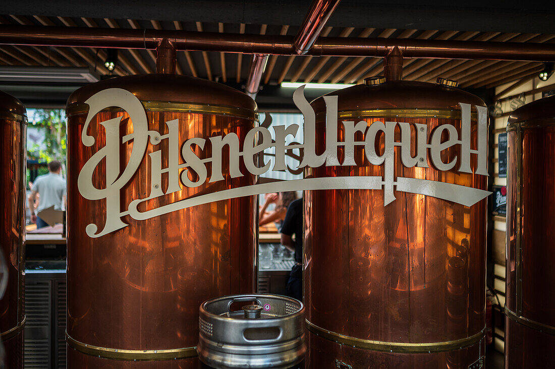 Pilsner Urquell beer at Manifesto Market, a must-visit cultural experience in the heart of Prague with pop-up design retail experience bars and high-quality street food.