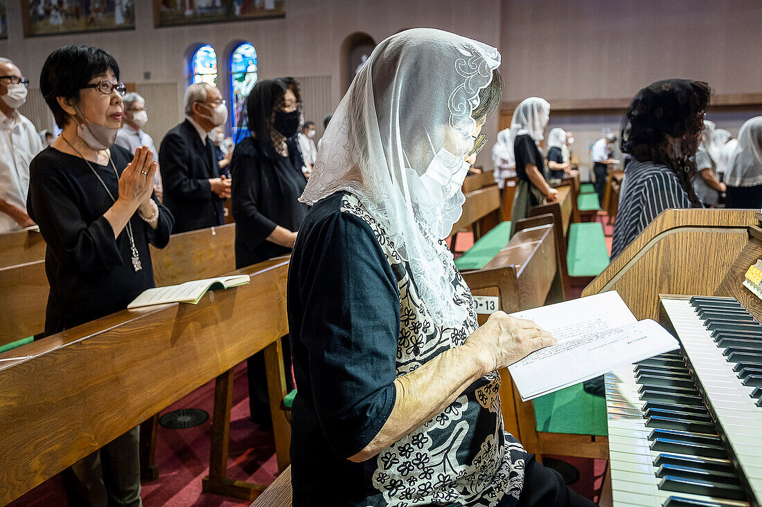 Morning mass on August 9th, every year, in memory of the victims of the atomic bomb. Urakami Cathedral, Nagasaki, Japan