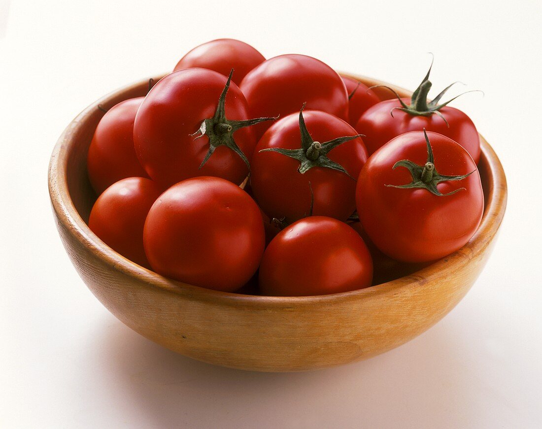 Tomatoes in a wooden bowl