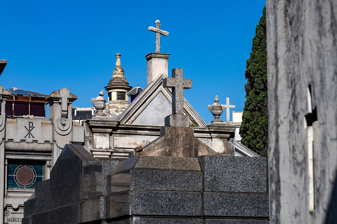 Crosses on elaborate tombs or mausoleums in the Recoleta Cemetery, Buenos Aires, Argentina.