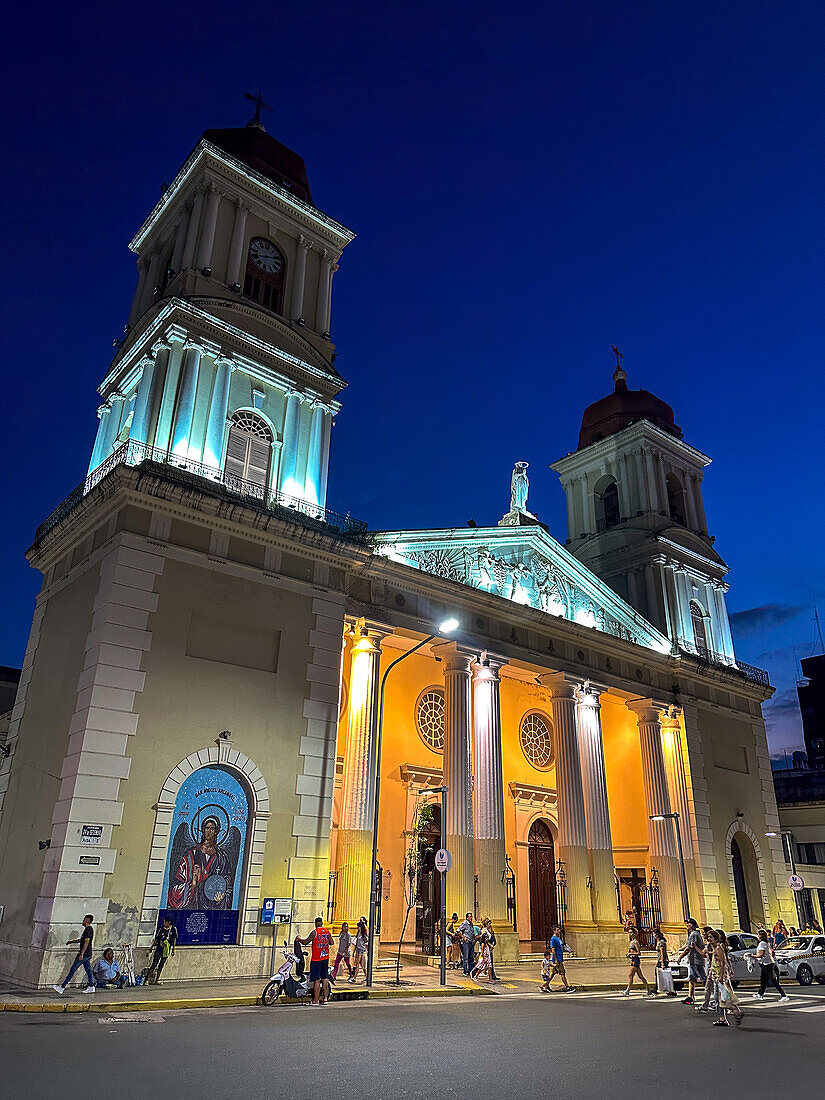 The facade & pediment of the Cathedral of Our Lady of the Incarnation at night in San Miguel de Tucumán, Argentina.