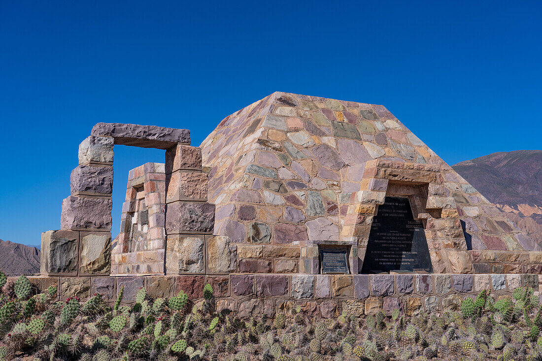 A modern pyramid built in the ruins in the Pucara of Tilcara, a pre-Hispanic archeological site near Tilcara, Argentina. The pyramid is a memorial to the archeologists who excavated the ruins.