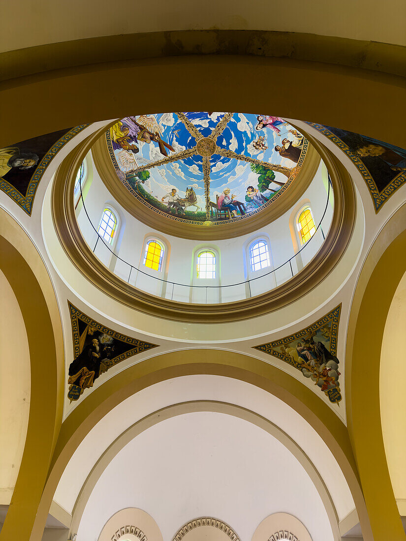 Interior of the dome and ceiling in the Church of Our Lady of the Rosary, Monteros, Argentina. The dome is painted with both Biblical and local scenes.