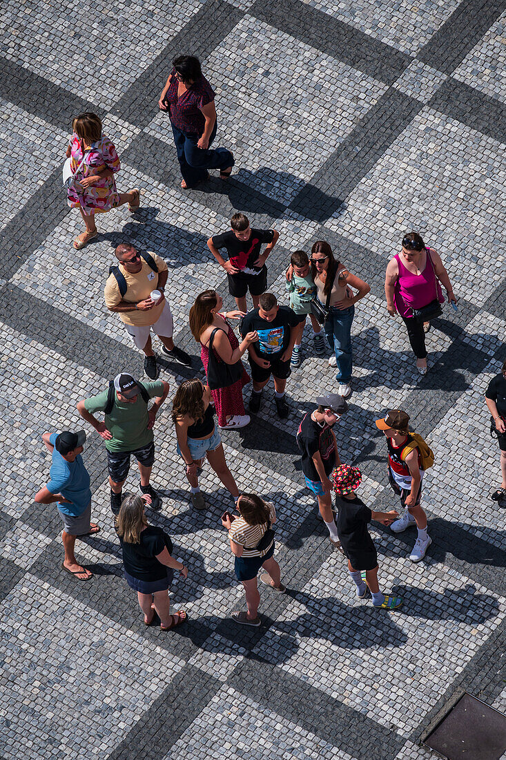 View of tourists and visitors from Old Town Hall tower in Prague