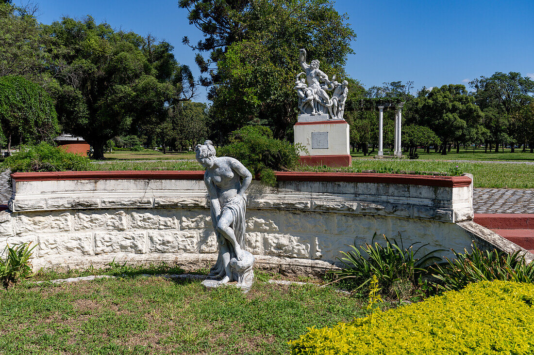 A painted iron copy of the marble statue of the Bathing Venus in the 9th of July Park, San Miguel de Tucumán, Argentina. Behind is Laocoon and His Sons.