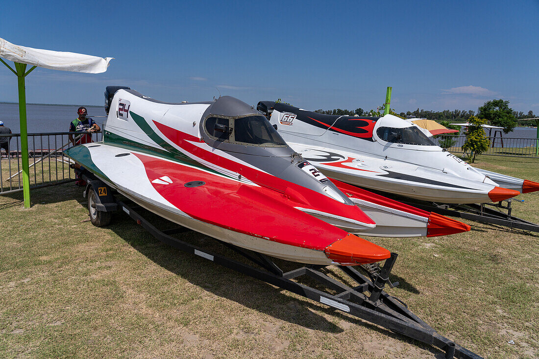 Racing boats on land before an F1 Powerboat race in Dique Frontal, Termas de Rio Hondo, Argentina.