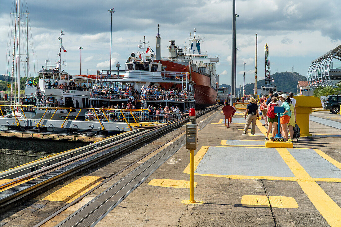 Ships passing through Miraflores Locks in the Panama Canal.