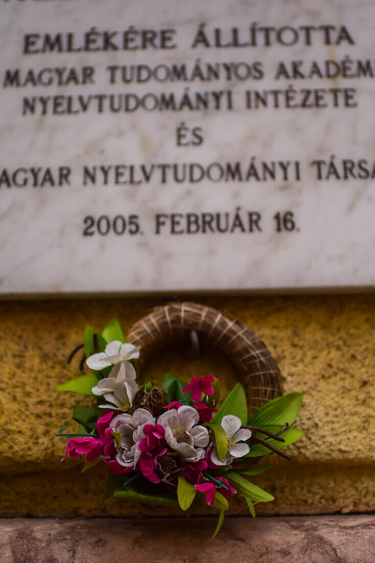 Flowers and commemorative plaque in Budapest