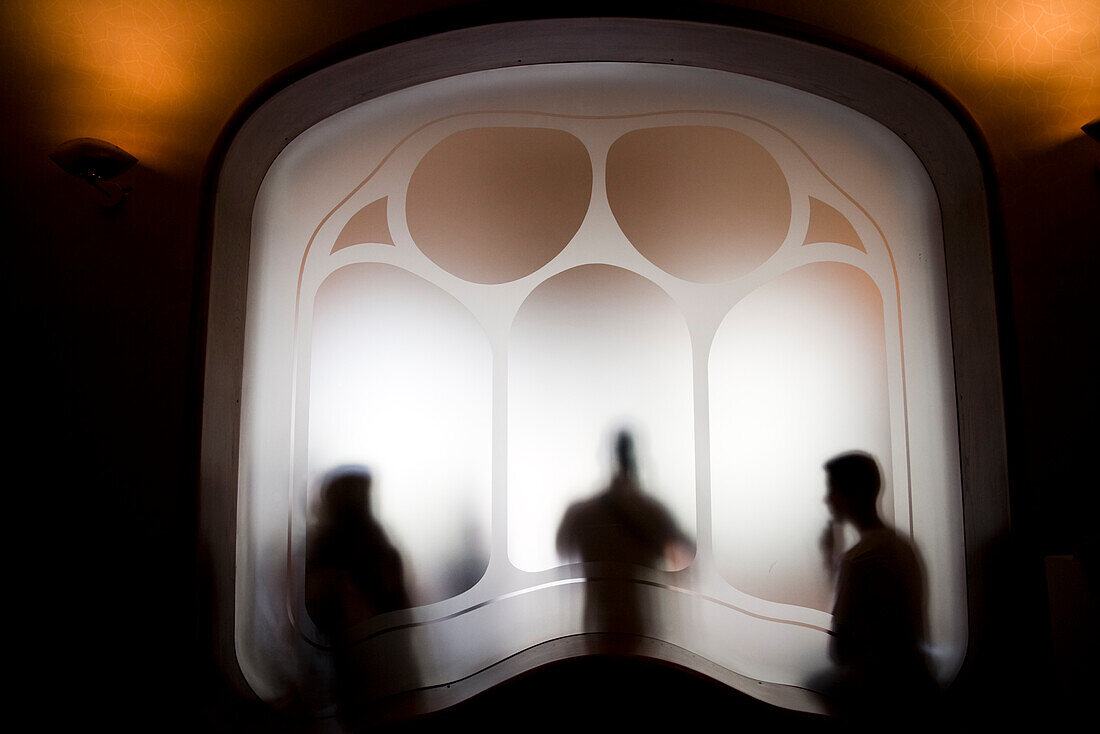 Barcelona, Spain, Sept 4 2008, Visitors admire the distinctive architectural window at Casa Batlló, showcasing Gaudís artistry and creativity in Barcelona.