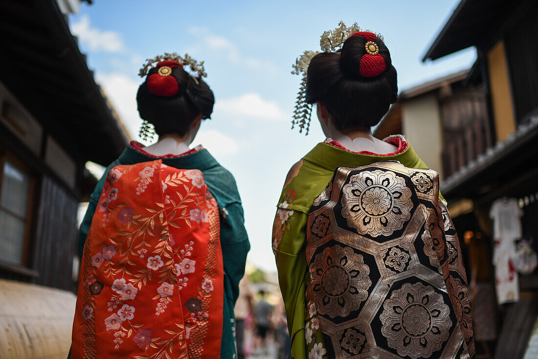 Group of women dressed as Maikos in the streets of Kyoto, Japan