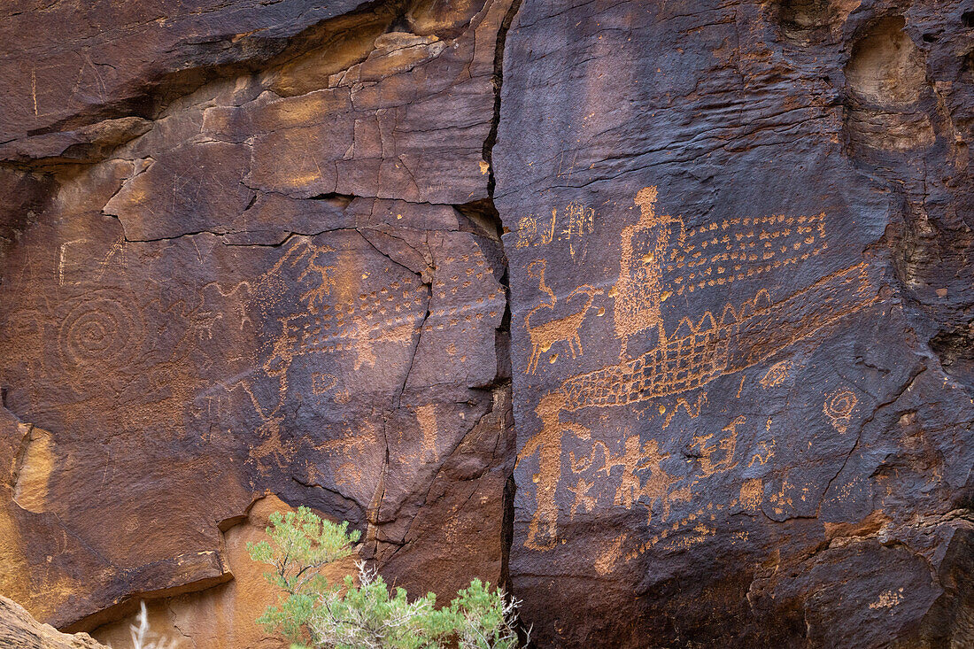 A pre-Hispanic Native American rock art or petroglyph panel in Nine Mile Canyon, Utah.