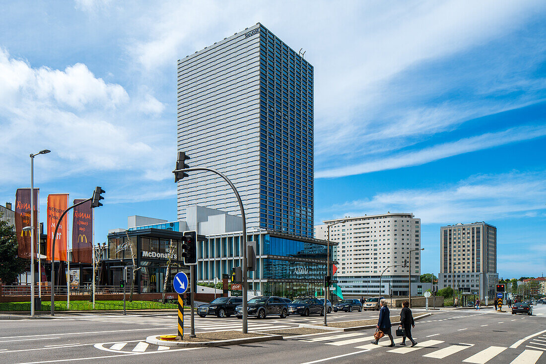 Porto, Portugal, Apr 15 2017, Dynamic urban scene showcasing modern architecture and bustling activity on Boavista Avenue in Porto, Portugal. Captures the essence of city life under a clear blue sky.