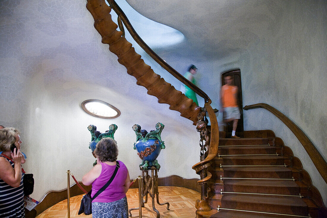 Barcelona, Spain, Sept 4 2008, Visitors admire the unique staircase and lobby of Casa Batlló, showcasing Gaudís architectural brilliance in Barcelona.