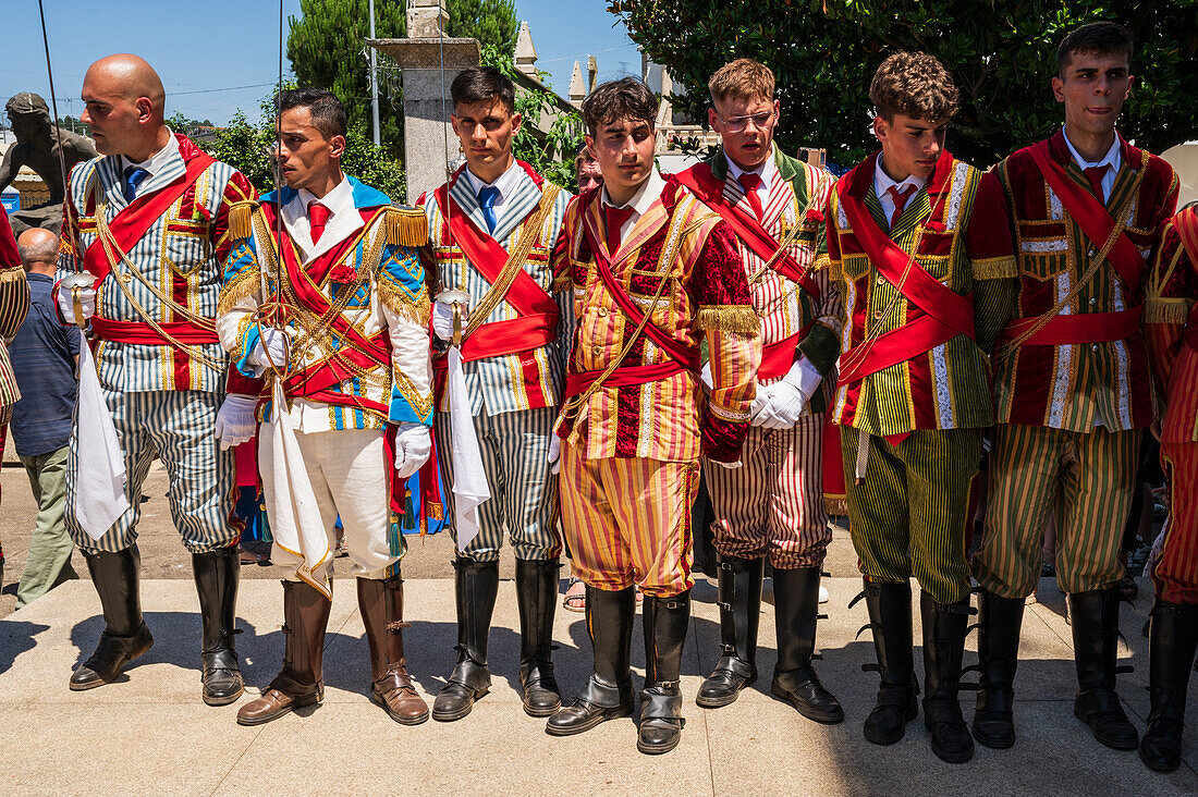 Religious procession enters São João Baptista Church during the Festival of Saint John of Sobrado, also known as Bugiada and Mouriscada de Sobrado, takes place in the form of a fight between Moors and Christians , locally known as Mourisqueiros and Bugios, Sao Joao de Sobrado, Portugal