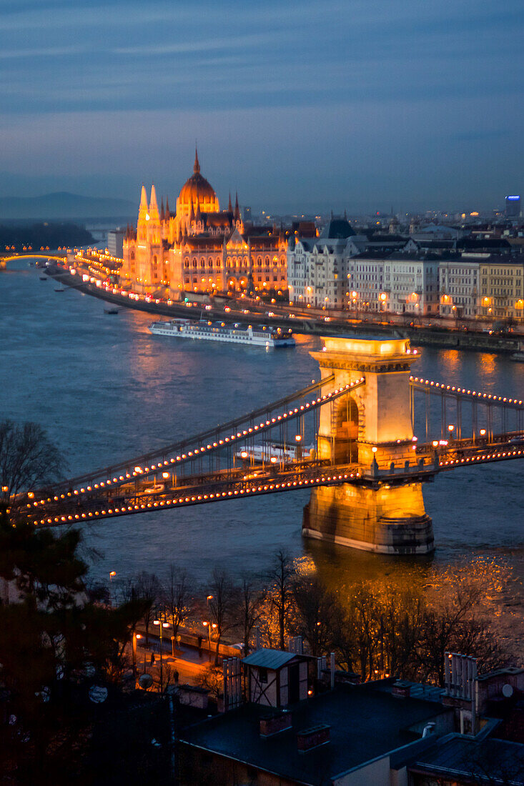 Illuminated Parliament building, Chain Bridge and Danube River at night, Budapest, Hungary, Europe