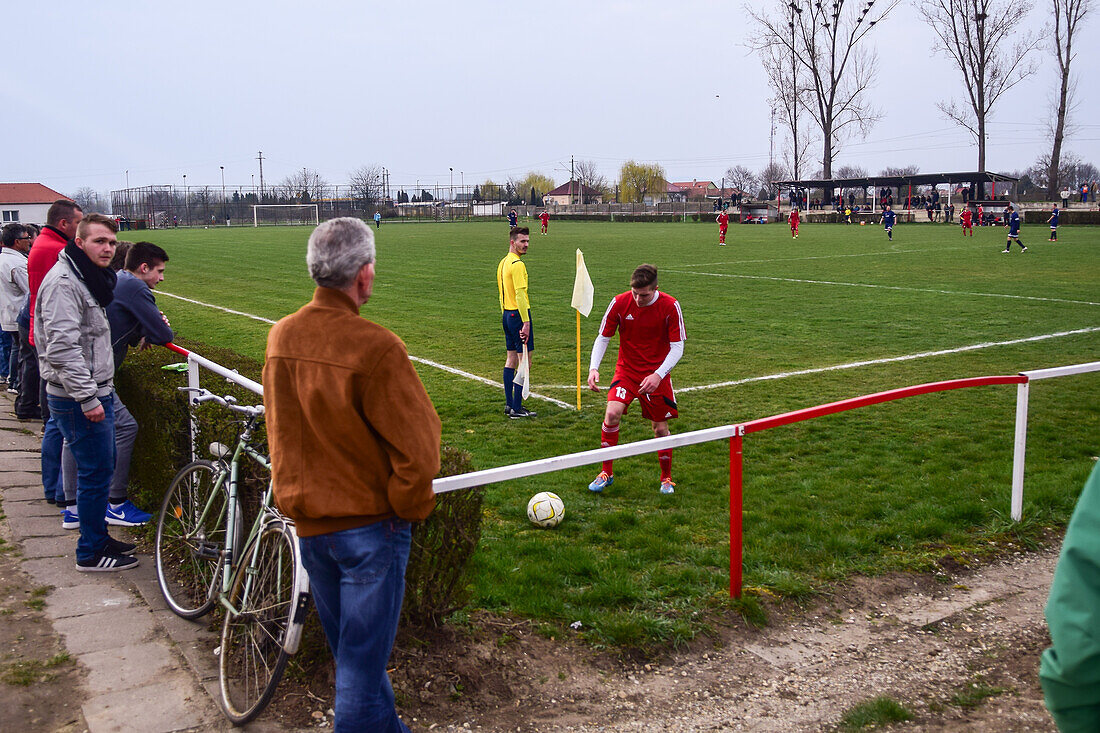 Corner kick during soccer youth game in small town of Hungary