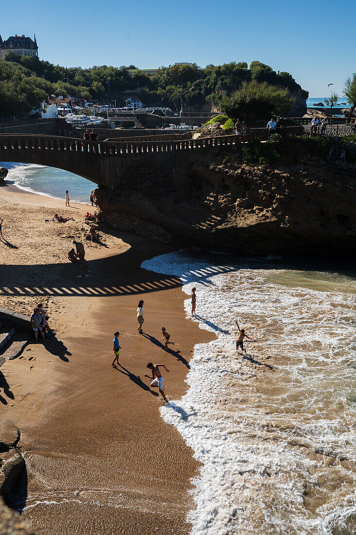 Beach under stone bridge Rocher du Basta, Biarritz, France