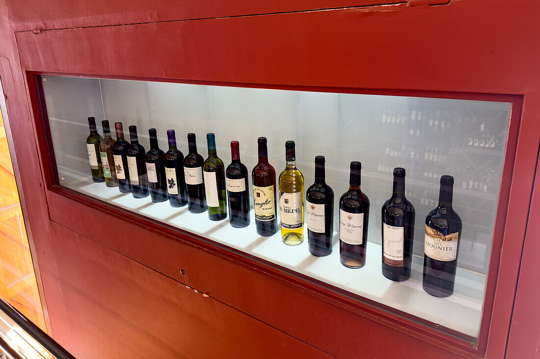 Local wines from the Calchaqui Valley on display in the shop in the Museo de la Vid y el Vino in Cafayate, Argentina.