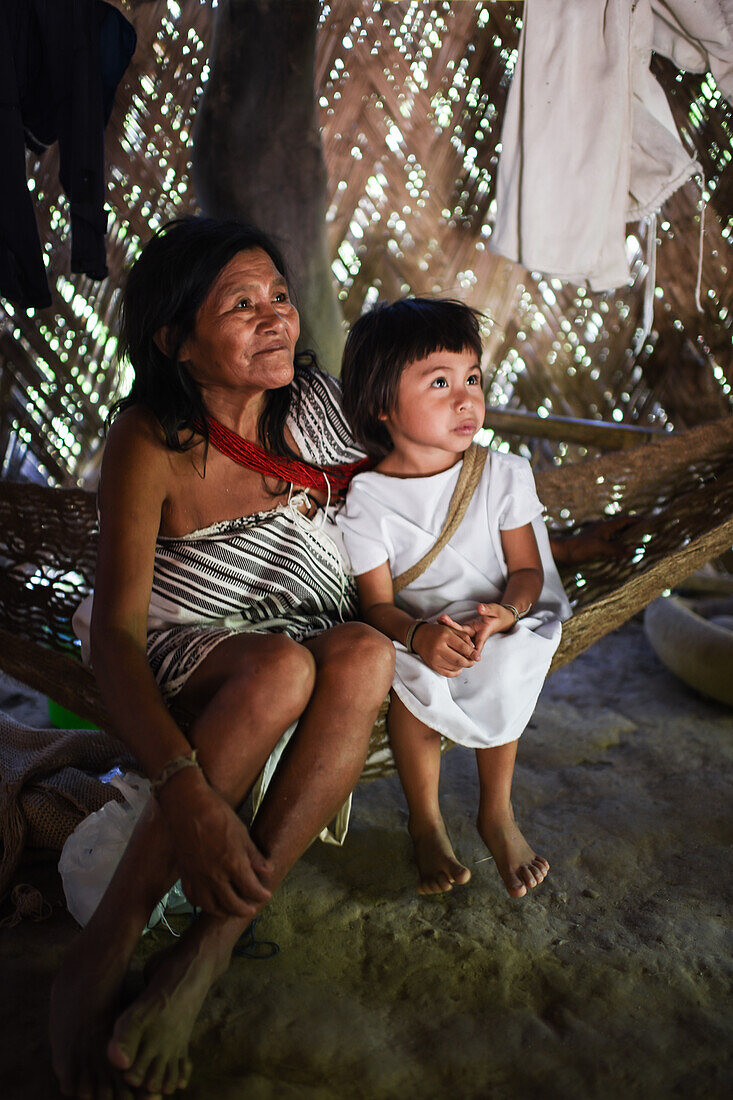 Kogi mamo (priest) and family. The Sierra Nevada de Santa Marta is home to the remnants of the Native American Tairona Culture. Koguis live in Resguardos Indigenas (Indian reserves) located in the mid-highland