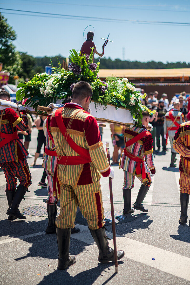 Religious procession finishing at São João Baptista Church during the Festival of Saint John of Sobrado, also known as Bugiada and Mouriscada de Sobrado, takes place in the form of a fight between Moors and Christians , locally known as Mourisqueiros and Bugios, Sao Joao de Sobrado, Portugal