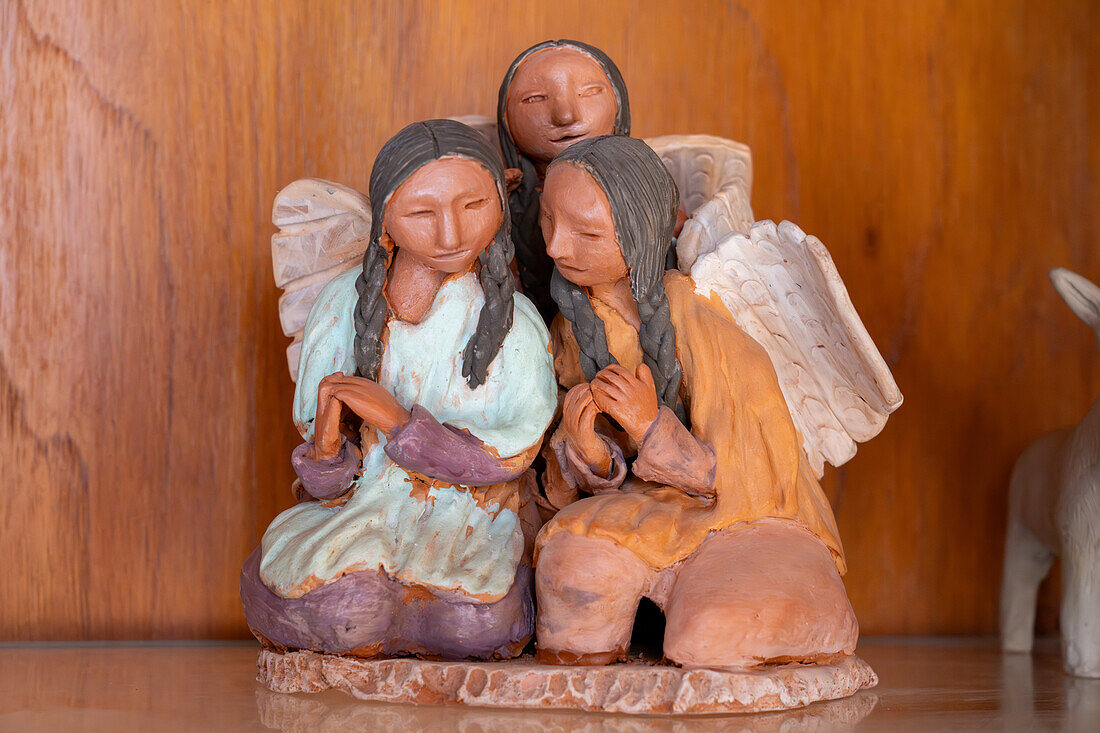 Ceramic angels by indigenous Aymara ceramic artist Santina Alabar in Purmamarca, Argentina.