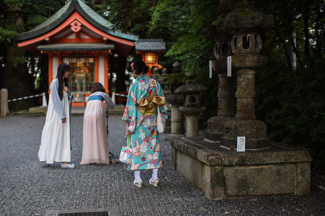 Exploring Fushimi Inari Taisha temple at night, Kyoto, Japan