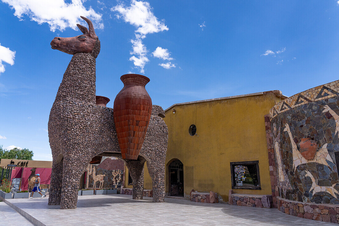 A giant llama statue made of rocks at Arte Guanuco in the Quebrada de Humahuaca or Humahuaca Valley in Argentina.